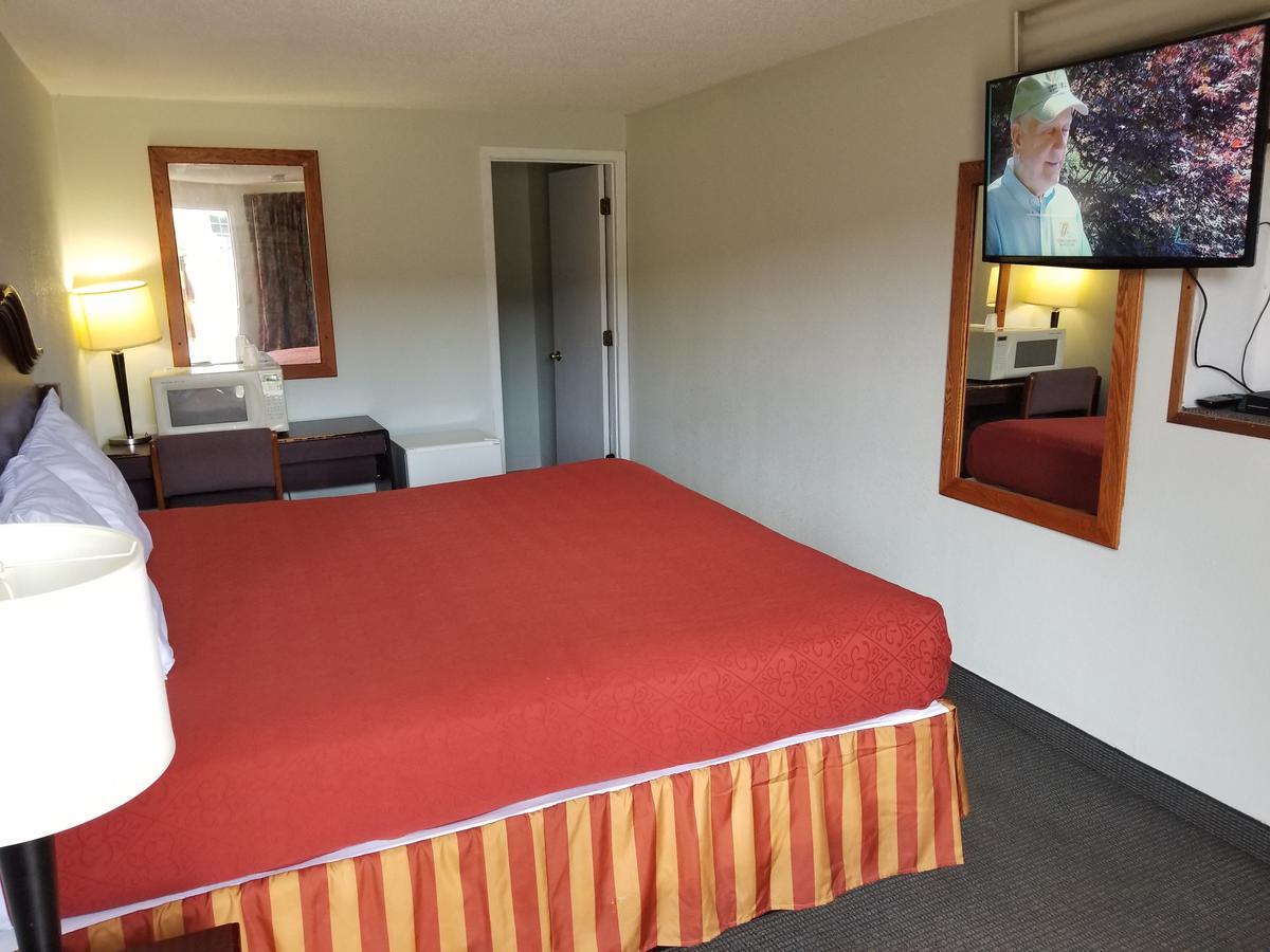 Budget Inn And Suites Иган Экстерьер фото