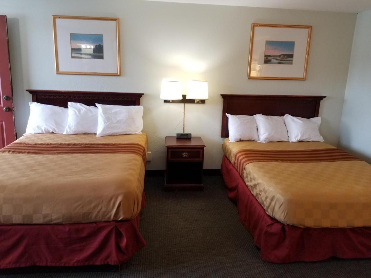 Budget Inn And Suites Иган Экстерьер фото