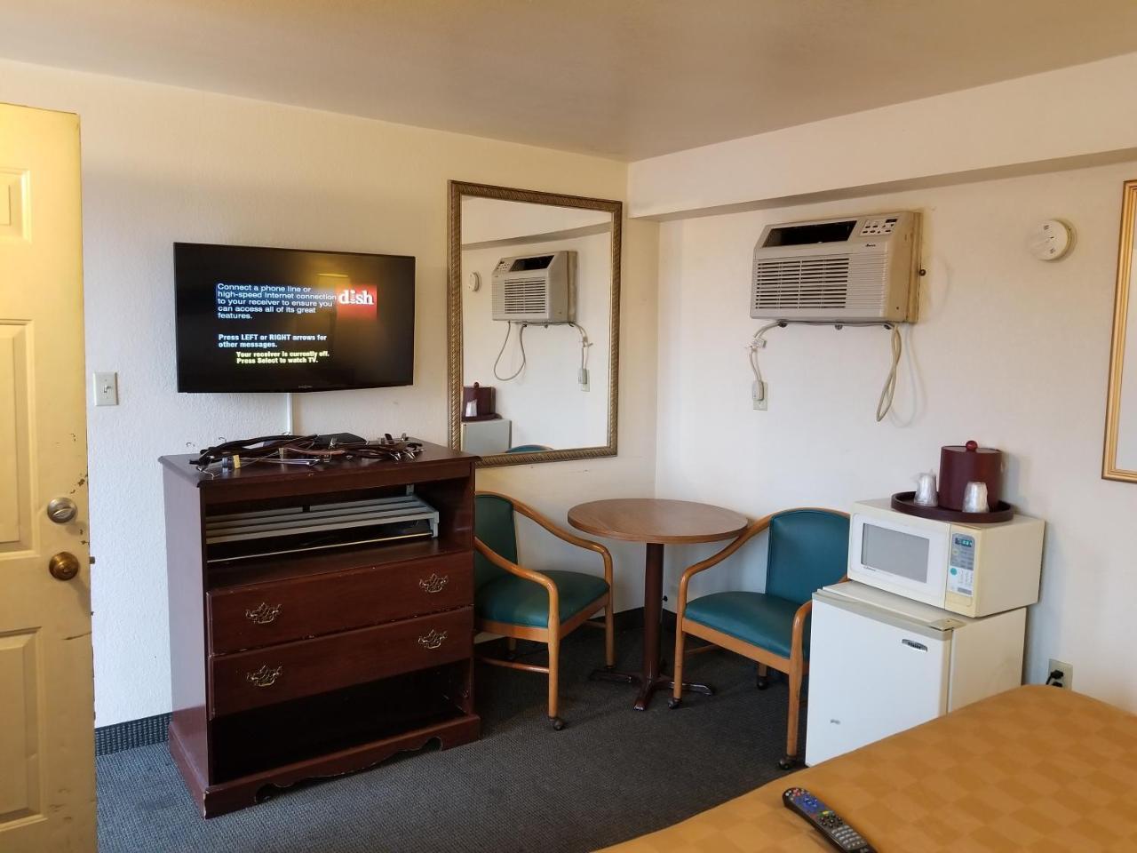 Budget Inn And Suites Иган Экстерьер фото