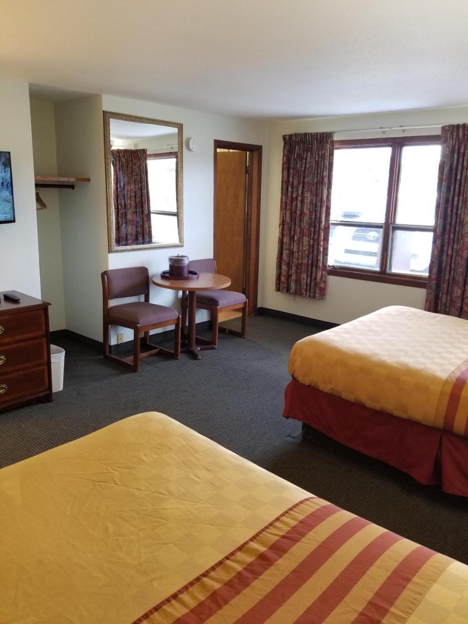 Budget Inn And Suites Иган Экстерьер фото
